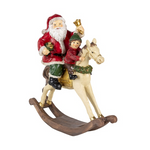 Piros ruhás télapó hintalovon gyermekkel vintage karácsonyi figura