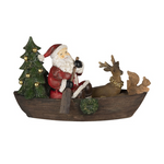 Piros ruhás télapó csónakban rénszarvassal vintage karácsonyi figura