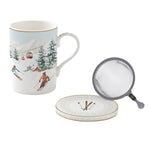 Porcelán karácsonyi bögre fém szűrővel díszdobozban síelés motívummal