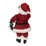 Karácsonyi télapó figura piros ruhás koszorúval