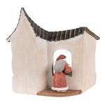 Télapó ablakban alvó gyermek mellett LED-es vintage karácsonyi figura